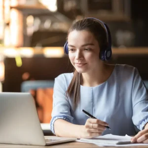 A Woman Listening And Writing